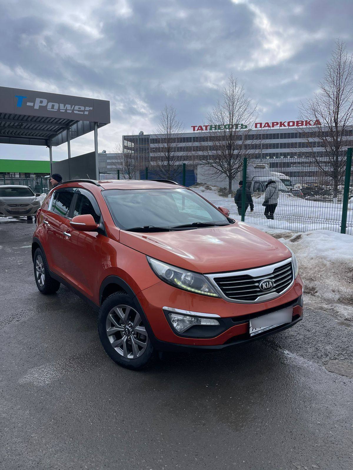 Купить Kia Sportage III Рестайлинг внедорожник 5 дв., 2014 года, цвет:  Оранжевый, за 1299000 руб. в Санкт-Петербурге